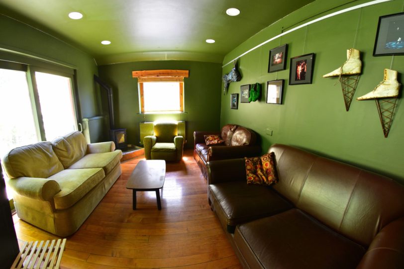 Sitting room with sofas, armchair and coffee table